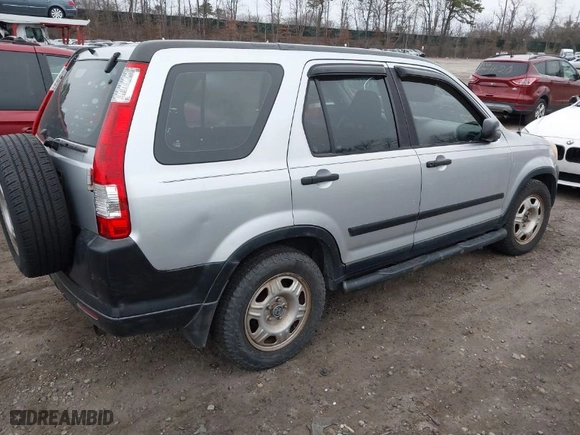 2006 Honda CR-V LX with VIN SHSRD68556U404171, listed as a IAAI auction lot 41927721 with 999,999 mi miles. Bid and sale history available at carsss.com. Image 4.
