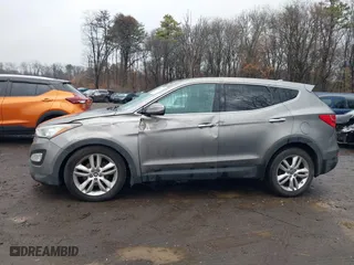 2013 Hyundai Santa Fe 2.0T Sport with VIN 5XYZWDLA3DG050022, listed as a IAAI auction lot 41957421 with 196,348 mi miles. Bid and sale history available at carsss.com. Image 14.