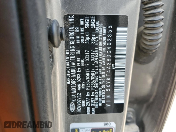 2013 Kia Sorento LX with VIN 5XYKT4A28DG402355, listed as a Copart auction lot 57441725 with 146,404 mi miles and Salvage title. Bid and sale history available at DreamBid. Image 13.