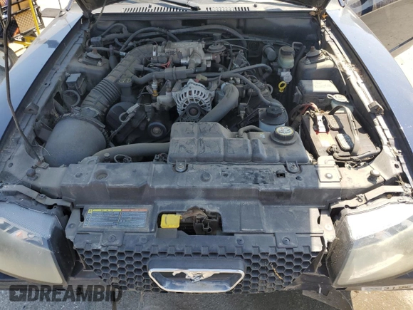 2002 Ford Mustang GT Deluxe z VIN 1FAFP45X22F101551, wystawiony jako Copart lot #55184645 z przebiegiem 137 971 mil mil oraz Szkoda całkowita • Salvage title. Historia ofert i sprzedaży dostępna na DreamBid. Obrazek 11.