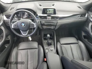 2018 BMW X1 xDrive28i with VIN WBXHT3C35J5L29298, listed as a Copart auction lot 59041435 with 27,612 mi miles and Salvage title. Bid and sale history available at DreamBid. Image 8.