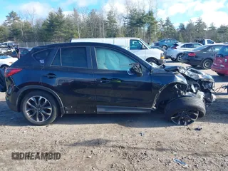 2016 Mazda CX-5 Grand Touring with VIN JM3KE4DY4G0909782, listed as a IAAI auction lot 41006111 with 30,135 mi miles. Bid and sale history available at carsss.com. Image 12.