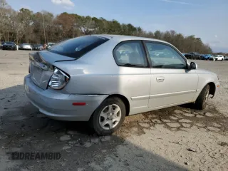 2003 Hyundai Accent GL with VIN KMHCG35CX3U270374, listed as a Copart auction lot 47240325 with 122,739 mi miles and Salvage Title. Bid and sale history available at carsss.com. Image 3.