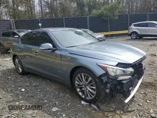 2019 Infiniti Q50 Luxe with VIN JN1EV7AR9KM553774, listed as a Copart auction lot 51593855 with 62,446 mi miles and Salvage title. Bid and sale history available at DreamBid. Image 4.