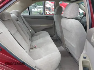 2002 Toyota Camry LE z VIN 4T1BE30K32U110304, wystawiony jako IAAI lot #42357455 z przebiegiem 221 389 mil mil oraz . Historia ofert i sprzedaży dostępna na DreamBid. Obrazek 8.