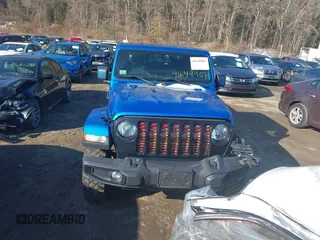 2021 Jeep Gladiator Willys with VIN 1C6HJTAG3ML572690, listed as a IAAI auction lot 41649907 with 74,734 mi miles and . Bid and sale history available at DreamBid. Image 13.
