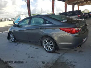 2013 Hyundai Sonata SE with VIN 5NPEC4AC7DH808979, listed as a Copart auction lot 45734105 with 131,908 mi miles and Salvage title. Bid and sale history available at DreamBid. Image 2.
