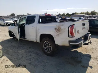 2019 GMC Canyon 4WD All Terrain w/Cloth with VIN 1GTG6FEN8K1138189, listed as a Copart auction lot 65260244 with 143,438 mi miles and Salvage Title. Bid and sale history available at carsss.com. Image 2.