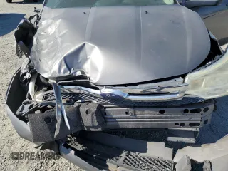2009 Ford Focus SE z VIN 1FAHP35N59W148326, wystawiony jako Copart lot #57688025 z przebiegiem Nie podano mil oraz Szkoda całkowita • Salvage title. Historia ofert i sprzedaży dostępna na DreamBid. Obrazek 11.