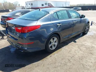 2015 Kia Optima LX with VIN KNAGM4A74F5569738, listed as a IAAI auction lot 41980622 with 161,434 mi miles. Bid and sale history available at carsss.com. Image 4.