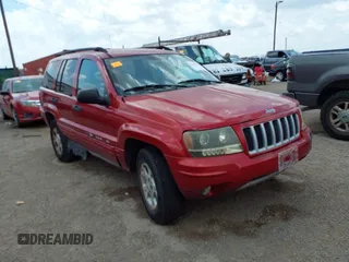 2004 Jeep Grand Cherokee Laredo with VIN 1J4GW48S04C389585, listed as a IAAI auction lot 42461413 with 228,672 mi miles and . Bid and sale history available at DreamBid. Image 1.