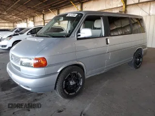 2002 Volkswagen EuroVan с VIN WV2KB47072H012135, выставлен на аукционе Copart как лот 84215364 с пробегом 170 220 миль миль и Чистый • Clean title. История ставок и продаж доступна на DreamBid. Изображение 1.