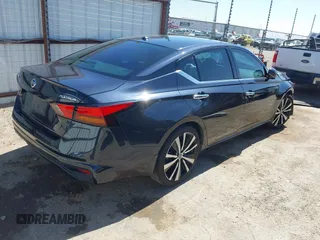2019 Nissan Altima 2.5 Platinum with VIN 1N4BL4FV1KC148496, listed as a IAAI auction lot 41767567 with 73,473 mi miles. Bid and sale history available at carsss.com. Image 4.