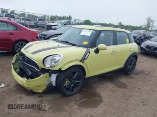 2012 MINI Countryman S z VIN WMWZC3C59CWL82955, wystawiony jako IAAI lot #42237702 z przebiegiem 61 903 mil mil oraz . Historia ofert i sprzedaży dostępna na DreamBid. Obrazek 2.