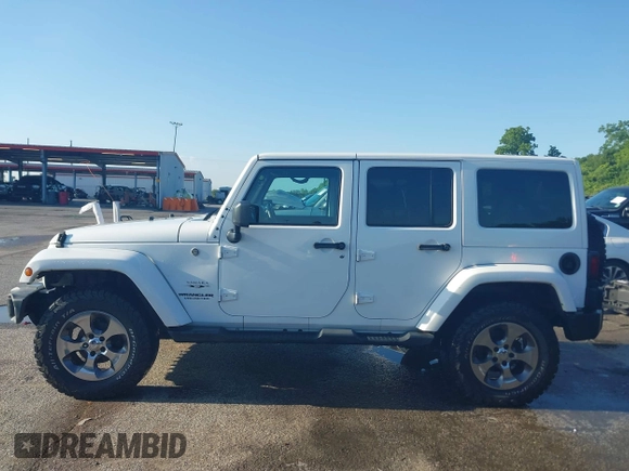 2016 Jeep Wrangler Unlimited 75th Anniversary z VIN 1C4BJWEG1GL250449, wystawiony jako IAAI lot #42204012 z przebiegiem 180 173 mil mil oraz . Historia ofert i sprzedaży dostępna na DreamBid. Obrazek 14.