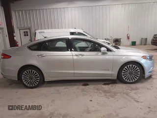 2018 Ford Fusion Titanium with VIN 3FA6P0RU9JR131818, listed as a IAAI auction lot 42442448 with 191,757 mi miles and . Bid and sale history available at DreamBid. Image 13.