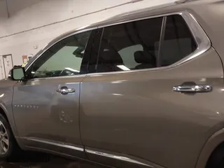 2018 Chevrolet Traverse Premier with VIN 1GNEVJKW0JJ165144, listed as a IAAI auction lot 41129951 with 137,593 mi miles. Bid and sale history available at carsss.com. Image 13.