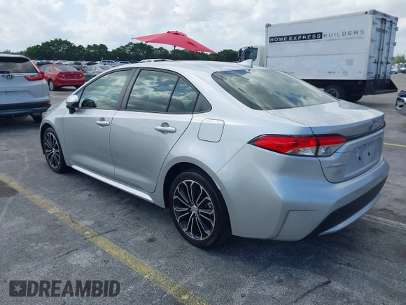 2020 Toyota Corolla LE with VIN JTDEPRAEXLJ023560, listed as a IAAI auction lot 41985501 with 59,529 mi miles. Bid and sale history available at carsss.com. Image 3.