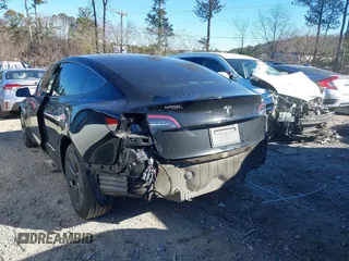2022 Tesla Model 3 with VIN 5YJ3E1EA9NF147836, listed as a IAAI auction lot 41363603 with 28,748 mi miles. Bid and sale history available at carsss.com. Image 6.