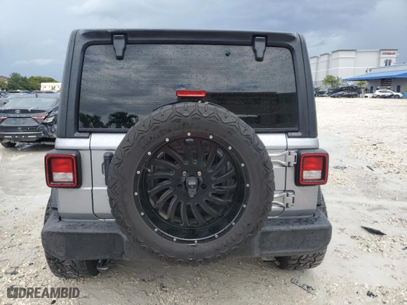 2018 Jeep Wrangler Unlimited Sport S with VIN 1C4HJXDG7JW179393, listed as a Copart auction lot 52069655 with 141,831 mi miles and Salvage Title. Bid and sale history available at carsss.com. Image 6.