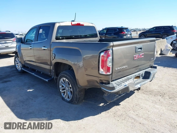 2015 GMC Canyon 2WD SLT with VIN 1GTG5CE32F1215628, listed as a IAAI auction lot 41412762 with 182,615 mi miles. Bid and sale history available at carsss.com. Image 3.
