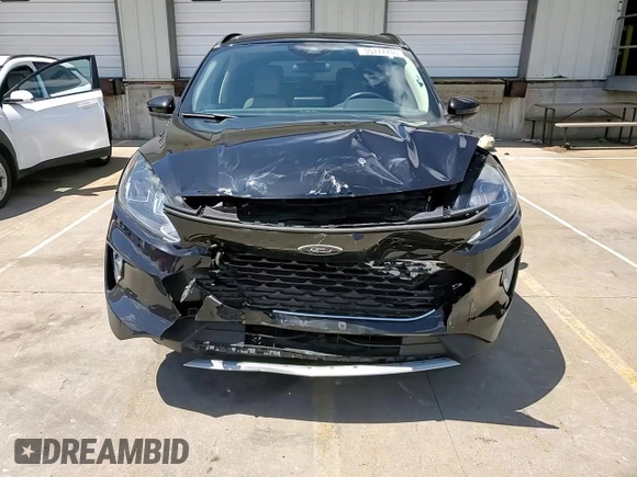 2020 Ford Escape SEL z VIN 1FMCU9H60LUC69333, wystawiony jako Copart lot #55777745 z przebiegiem 44 219 mil mil oraz Szkoda całkowita • Salvage title. Historia ofert i sprzedaży dostępna na DreamBid. Obrazek 13.