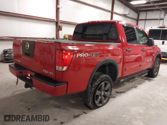 2012 Nissan Titan SV with VIN 1N6AA0EC7CN327973, listed as a IAAI auction lot 41841596 with 148,519 mi miles. Bid and sale history available at carsss.com. Image 4.