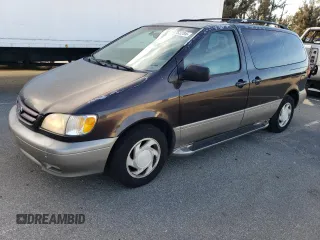 2002 Toyota Sienna LE with VIN 4T3ZF13CX2U457768, listed as a Copart auction lot 84763284 with 195,268 mi miles and Salvage Title. Bid and sale history available at carsss.com. Image 1.