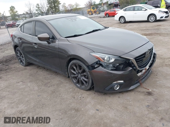 2014 Mazda 3 S Grand Touring with VIN JM1BM1W39E1145186, listed as a IAAI auction lot 41948404 with 111,702 mi miles and . Bid and sale history available at DreamBid. Image 1.