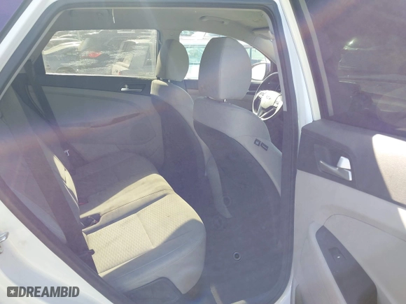 2019 Hyundai Tucson Value with VIN KM8J33A43KU067973, listed as a IAAI auction lot 40122626 with 107,358 mi miles. Bid and sale history available at carsss.com. Image 8.