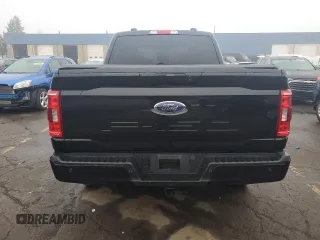 2023 Ford F-150 XL with VIN 1FTFW1ED2PFD30384, listed as a Copart auction lot 55593215 with 21,107 mi miles and Clean title. Bid and sale history available at DreamBid. Image 6.