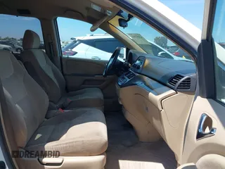 2007 Honda Odyssey EX with VIN 5FNRL38487B075936, listed as a IAAI auction lot 42052061 with 188,279 mi miles and . Bid and sale history available at DreamBid. Image 5.