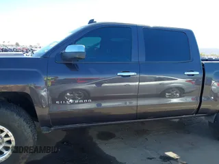 2014 Chevrolet Silverado 1500 LT with VIN 3GCUKRECXEG343680, listed as a IAAI auction lot 41793356 with 138,404 mi miles and . Bid and sale history available at DreamBid. Image 14.