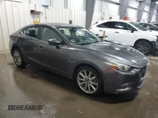 2017 Mazda 3 Touring with VIN 3MZBN1V74HM149040, listed as a Copart auction lot 59917855 with 204,440 mi miles and Salvage title. Bid and sale history available at DreamBid. Image 4.