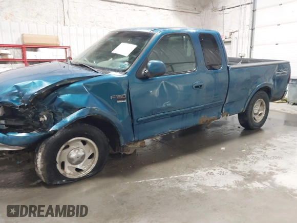 2000 Ford F-150 XL z VIN 1FTRX18L7YKB27657, wystawiony jako IAAI lot #42262373 z przebiegiem Nie podano mil oraz . Historia ofert i sprzedaży dostępna na DreamBid. Obrazek 6.