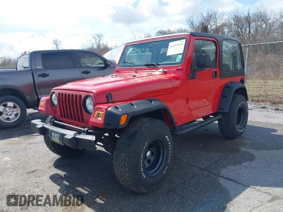 2002 Jeep Wrangler X with VIN 1J4FA39S02P739211, listed as a IAAI auction lot 41665910 with 144,118 mi miles. Bid and sale history available at carsss.com. Image 2.
