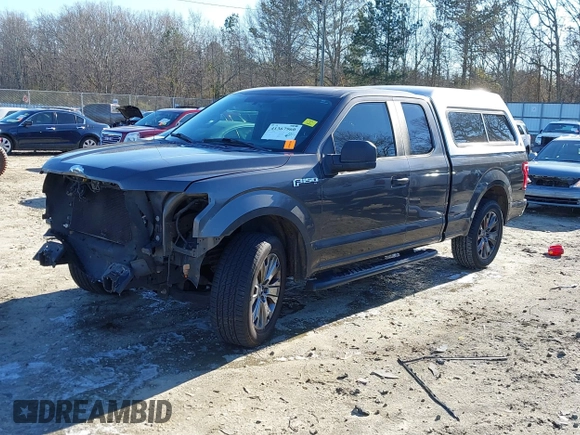 2015 Ford F-150 XL with VIN 1FTEX1C85FKD46390, listed as a IAAI auction lot 41367960 with 209,889 mi miles. Bid and sale history available at carsss.com. Image 2.