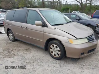 2004 Honda Odyssey EX with VIN 5FNRL18684B072343, listed as a IAAI auction lot 41945142 with 222,990 mi miles and . Bid and sale history available at DreamBid. Image 1.