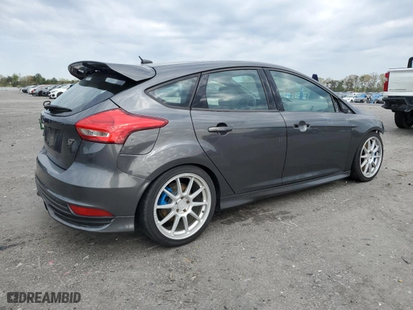 2017 Ford Focus ST with VIN 1FADP3L93HL309681, listed as a Copart auction lot 52079625 with 104,851 mi miles and Salvage Title. Bid and sale history available at carsss.com. Image 3.