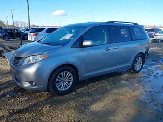2016 Toyota Sienna XLE with VIN 5TDYK3DC3GS744752, listed as a IAAI auction lot 41077851 with 147,319 mi miles. Bid and sale history available at carsss.com. Image 19.