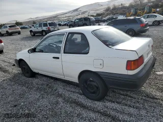 1994 Toyota Tercel with VIN JT2EL46S5R0447670, listed as a Copart auction lot 85165504 with 214,199 mi miles and Salvage Title. Bid and sale history available at carsss.com. Image 2.