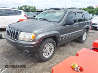 2002 Jeep Grand Cherokee Limited with VIN 1J8GW58N22C173250, listed as a IAAI auction lot 42480524 with 162,341 mi miles and . Bid and sale history available at DreamBid. Image 2.