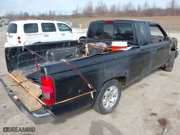 2000 Nissan Frontier 2WD XE with VIN 1N6DD26S1YC307758, listed as a IAAI auction lot 41902443 with 76,560 mi miles. Bid and sale history available at carsss.com. Image 4.