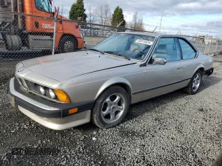1986 BMW 6 Series 635CSi with VIN WBAEC8409G0613604, listed as a Copart auction lot 85919534 with 176,988 mi miles and Salvage Title. Bid and sale history available at carsss.com. Image 1.