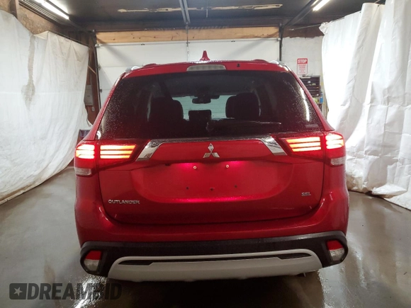 2020 Mitsubishi Outlander ES z VIN JA4AZ3A31LZ038089, wystawiony jako Copart lot #57866355 z przebiegiem 74 132 mil mil oraz Szkoda całkowita • Salvage title. Historia ofert i sprzedaży dostępna na DreamBid. Obrazek 6.