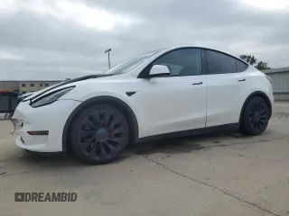 2022 Tesla Model Y Performance z VIN 7SAYGDEF6NF453165, wystawiony jako Copart lot #54547235 z przebiegiem 51 797 mil mil oraz Szkoda całkowita • Salvage title. Historia ofert i sprzedaży dostępna na DreamBid. Obrazek 1.