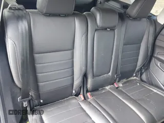 2016 Ford Escape Titanium with VIN 1FMCU9JX5GUA96563, listed as a IAAI auction lot 41695524 with 76,992 mi miles. Bid and sale history available at carsss.com. Image 8.