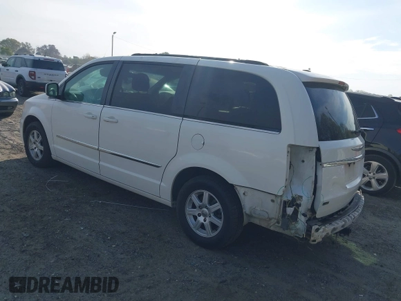 2012 Chrysler Town & Country Touring z VIN 2C4RC1BG6CR213480, wystawiony jako IAAI lot #41887256 z przebiegiem 153 200 mil mil oraz . Historia ofert i sprzedaży dostępna na DreamBid. Obrazek 3.