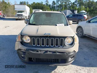 2015 Jeep Renegade Latitude with VIN ZACCJBBT0FPB67030, listed as a IAAI auction lot 41866195 with 120,618 mi miles. Bid and sale history available at carsss.com. Image 6.