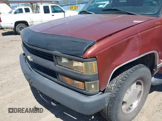 1999 Chevrolet Tahoe Z71 with VIN 1GNEK13R4XJ341736, listed as a IAAI auction lot 42218712 with 282,663 mi miles and . Bid and sale history available at DreamBid. Image 6.